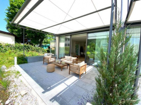 Cinema House - Ferienhaus im Natural Living Look mit Heimkino und Südterrasse - 136 qm